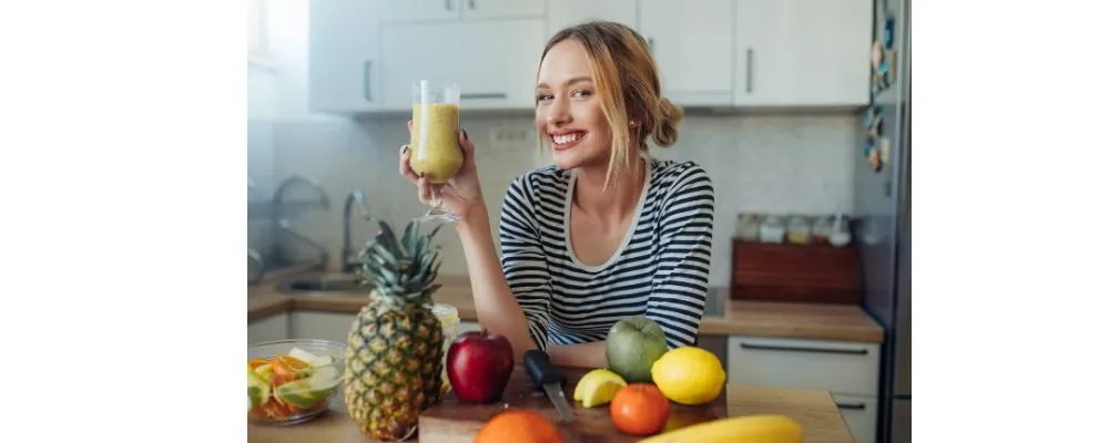 Morning Cleanse - Lady drinking juice